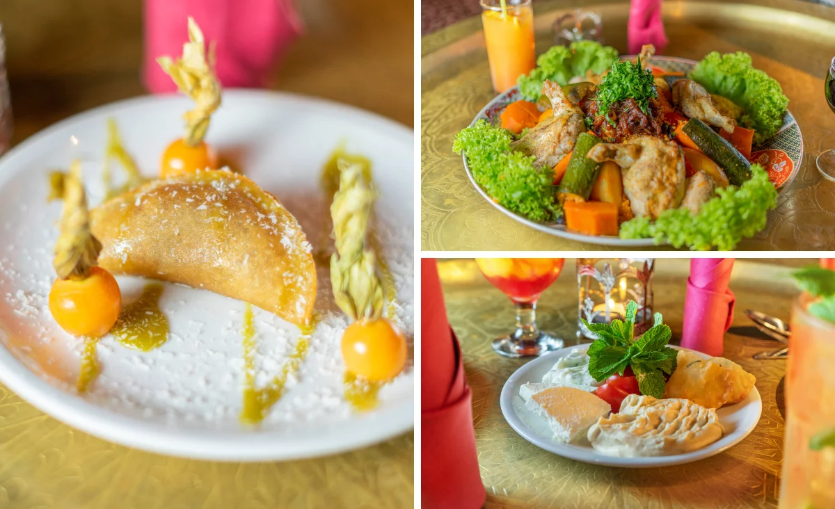 Teller mit gebratenen Hähnchenteilen, Gemüse und Salatblättern auf einem goldfarbenen Tisch